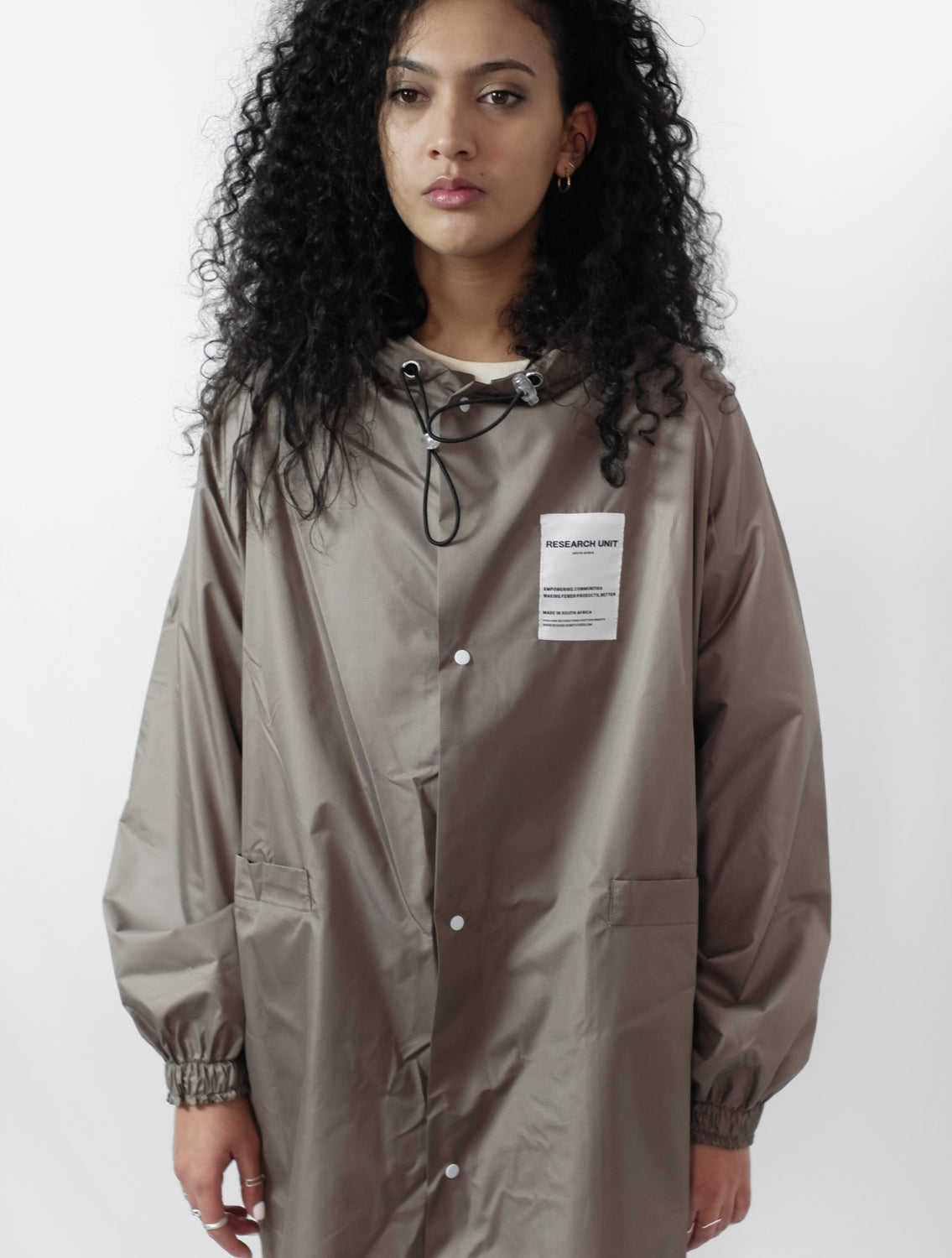 Ripstop Waterproof Rain Jacket (Stone) High Quality and Premium materials. Mid length and unisex