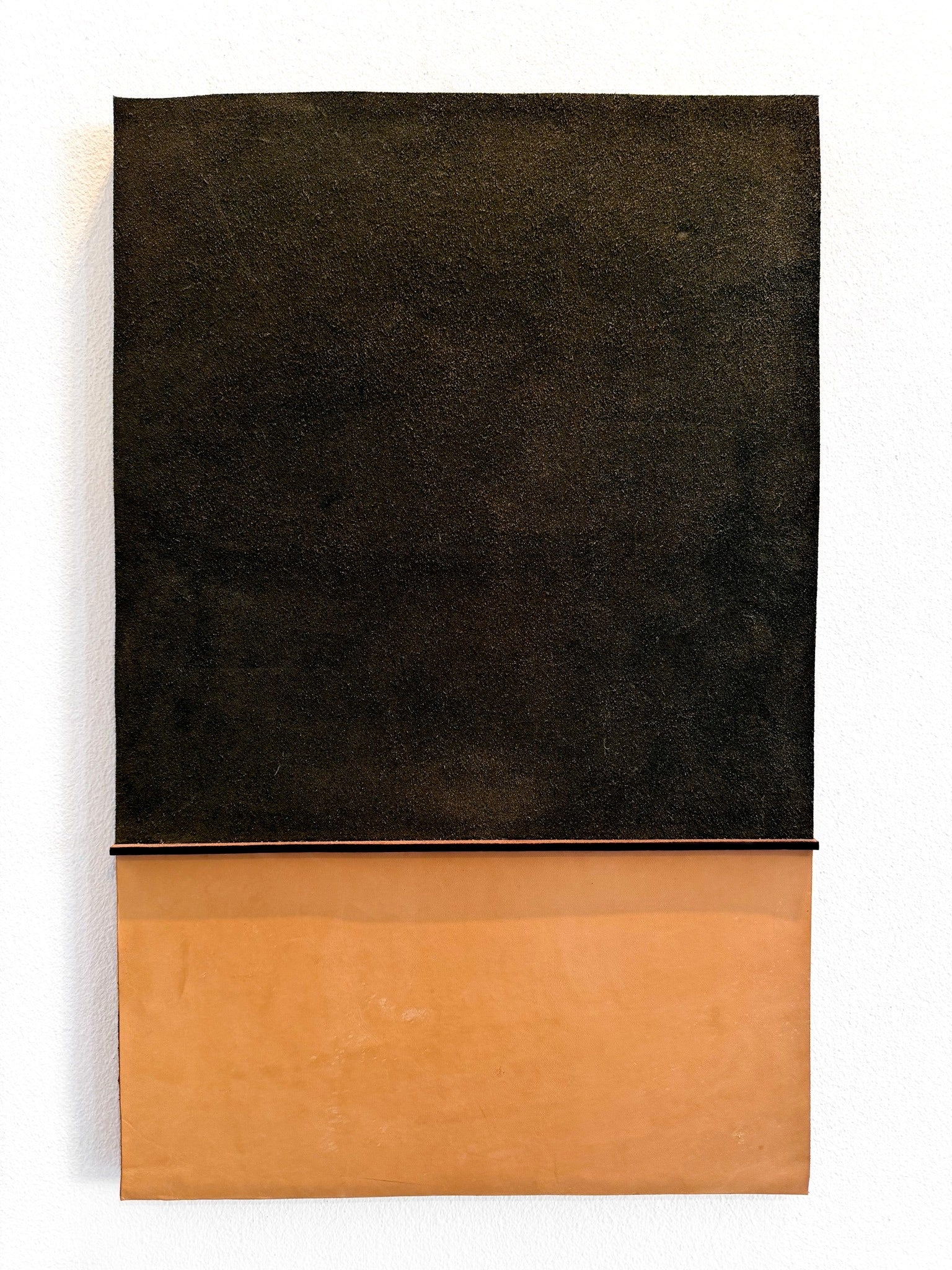 A minimalist abstract wall art piece featuring a two-tone rectangular design, with a large dark brown textured upper section and a warm tan lower section, mounted on a white wall.