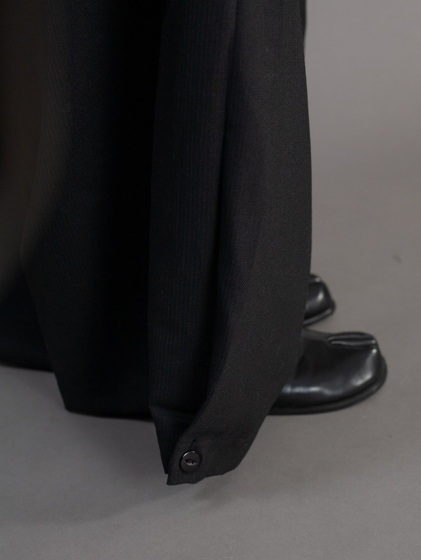 button detail on hem