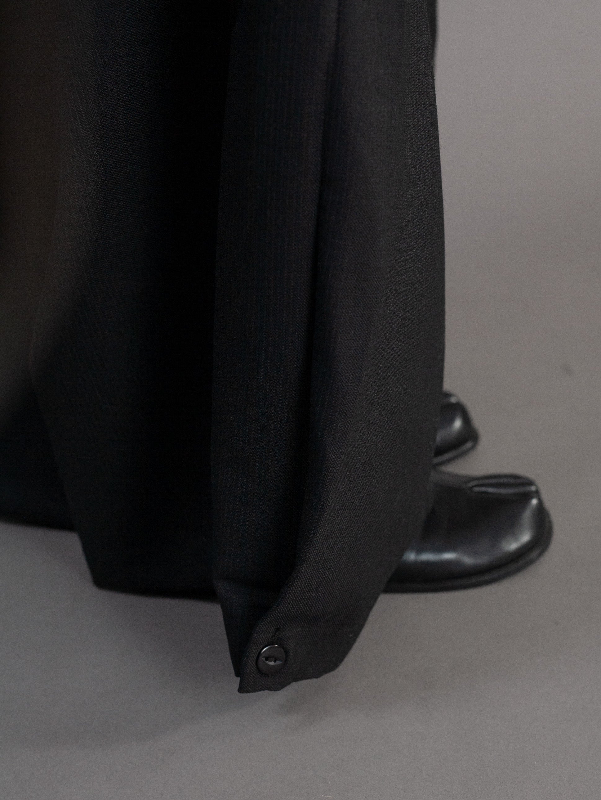 button detail on hem