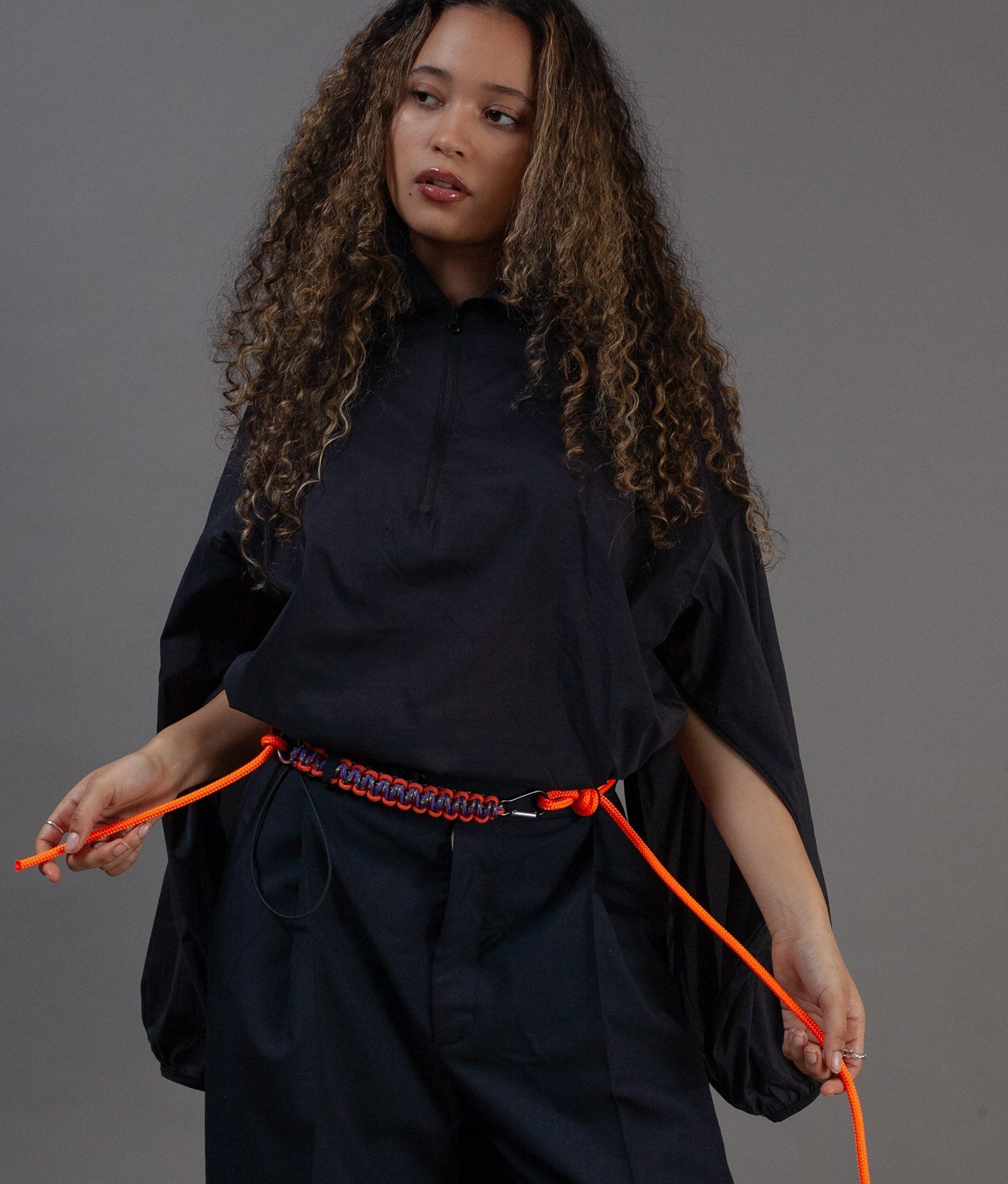 zipped up top with zip under sleeves
